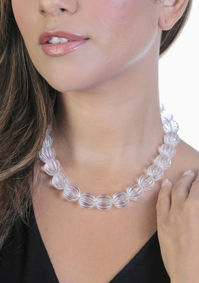 Woman Wearing Clear Crystal Quartz Necklace