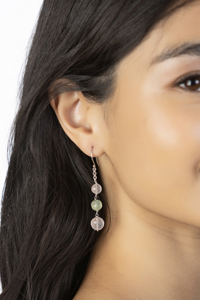 Woman Wearing Rose Quartz and Prehnite Earrings