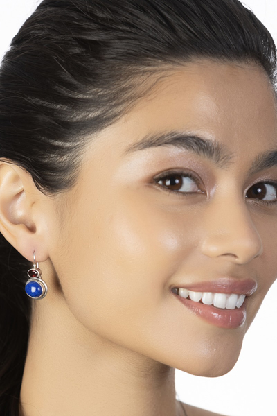 Woman Wearing Lapis Lazuli and Garnet Earrings