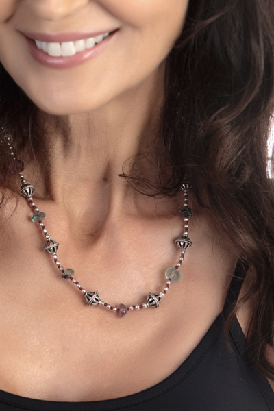 Woman Wearing African Gemstone Necklace