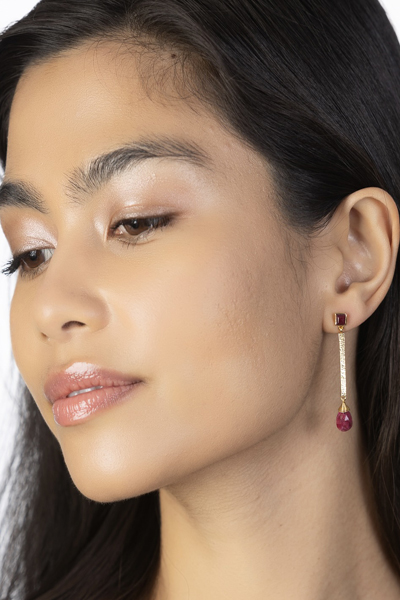 Woman Wearing Hanging Rubies earrings