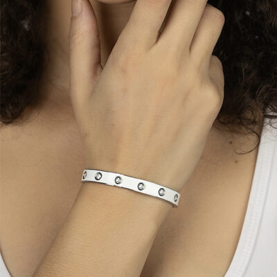 Woman Wearing White Taiwan Bracelet