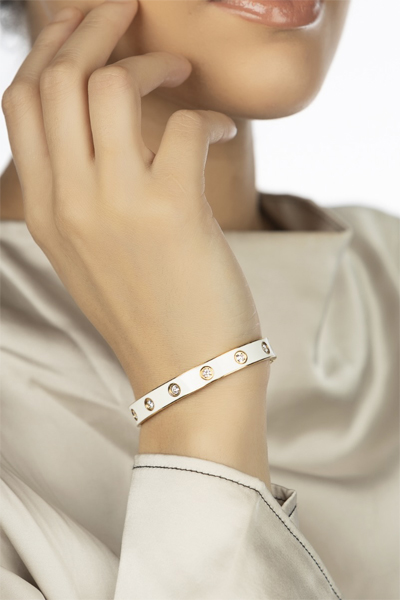 Woman Wearing Golden White Taiwan Bracelet