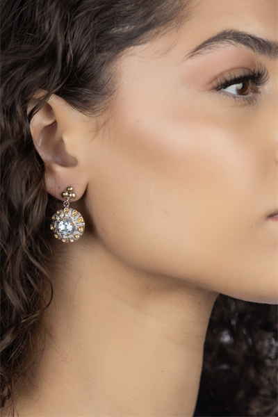 Woman Wearing Blue Topaz Turkish Earrings