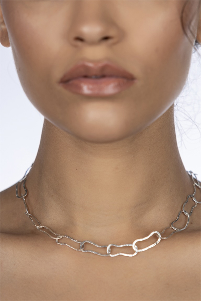 Woman Wearing South African Hammered Silver Necklace