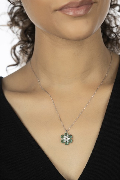 Woman Wearing Turkish Necklace of Green and White Blooms