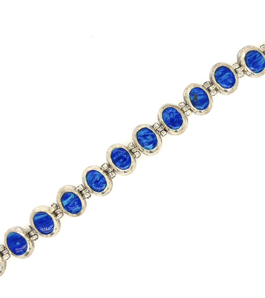 Blue Stones sparkle in Sterling Silver Bracelet