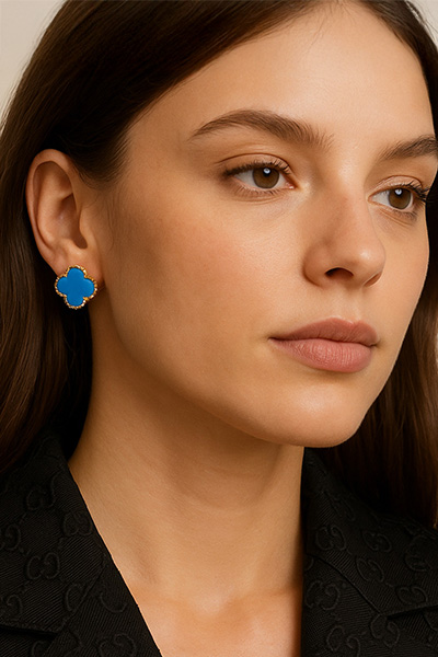 Woman Wearing Blue Amazonite Quatrefoil and Gold Earrings