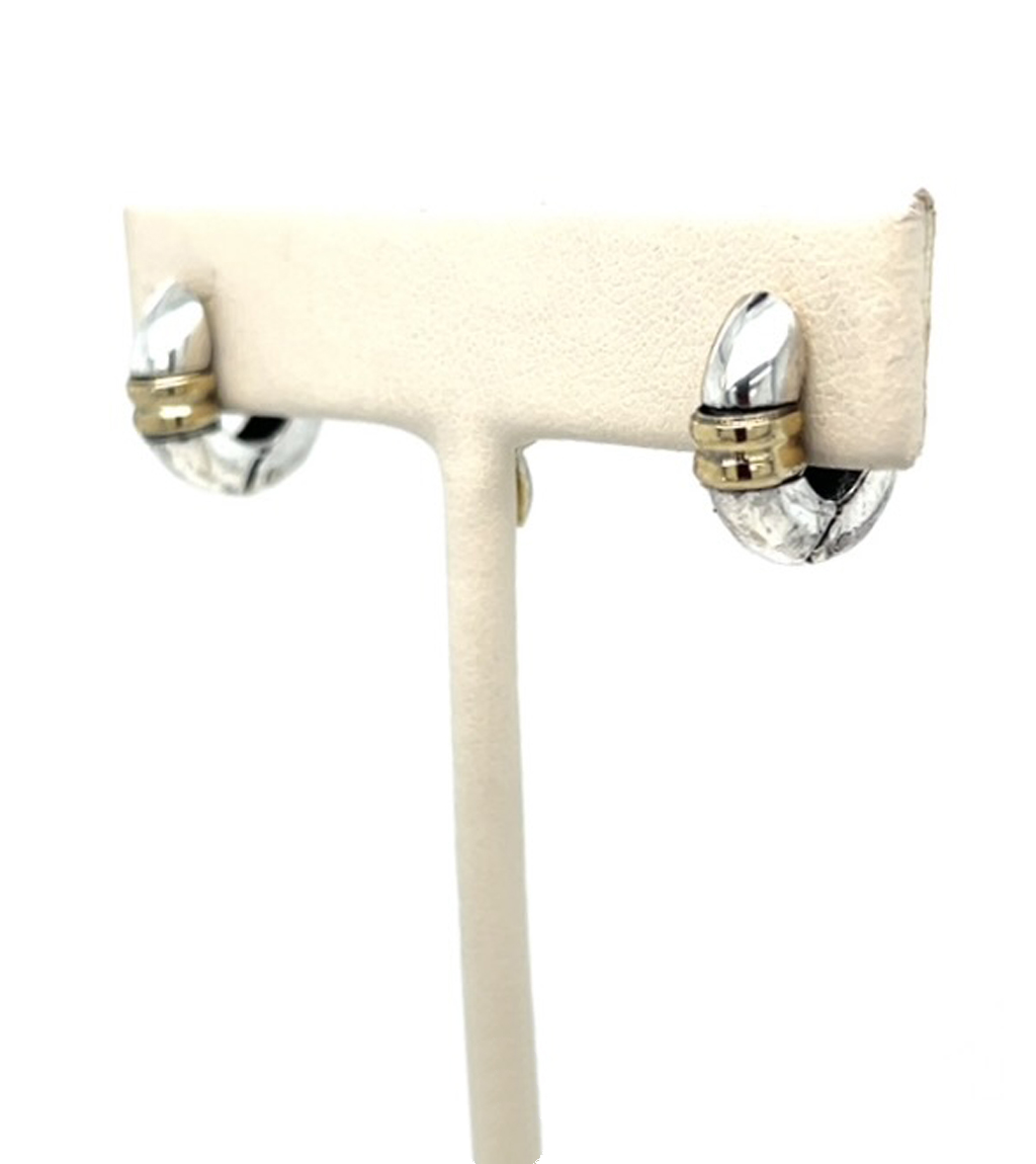 Sterling Silver and Yellow Gold marry in Hinged Hoops