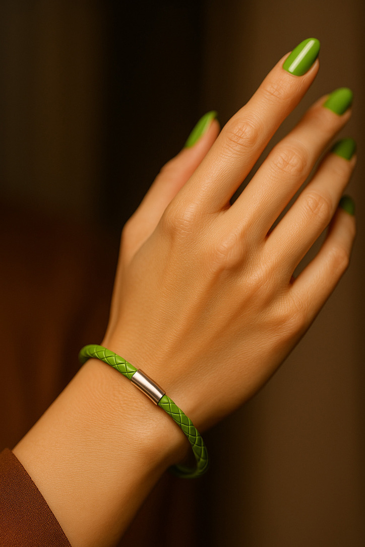 Woman Hand Wearing Green Leather German Bracelet