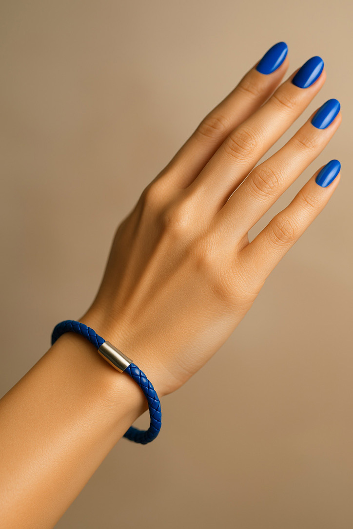 Female Hand Wearing Cobalt Blue German Bracelet