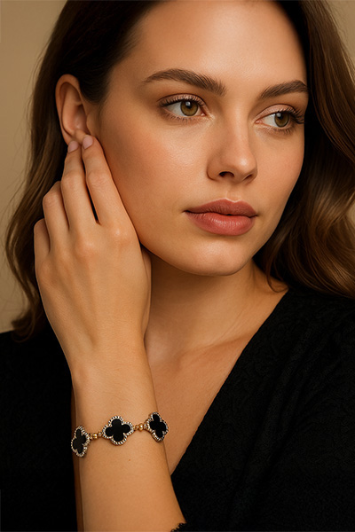 Woman Wearing Black Onyx Quatrefoil Bracelet