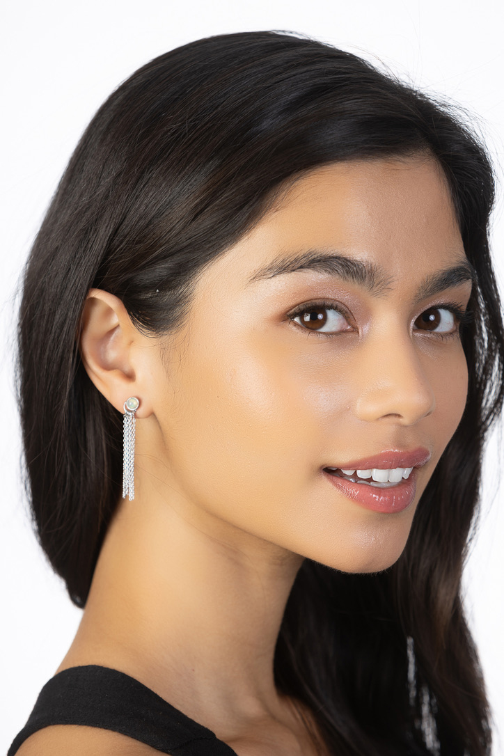 Woman Wearing Opal and fringe in French Earrings