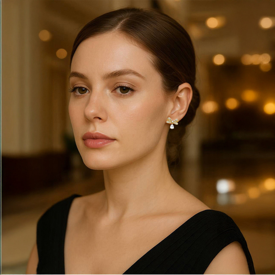 Woman Wearing Bowed with a drop in French Earrings