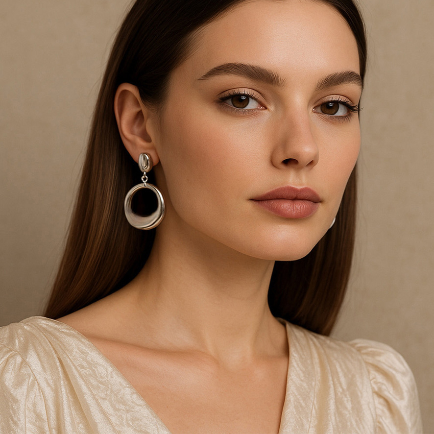 Woman Wearing Italian Drop Hoop Earrings
