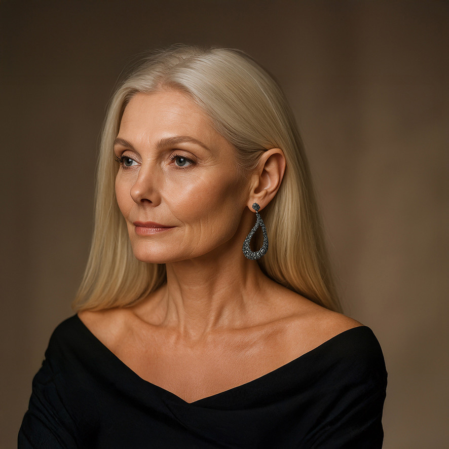 Woman Wearing Large open tear drop Black Earrings