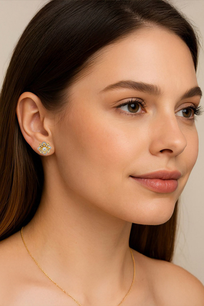 Woman Wearing Inspired by Buccellati Earrings