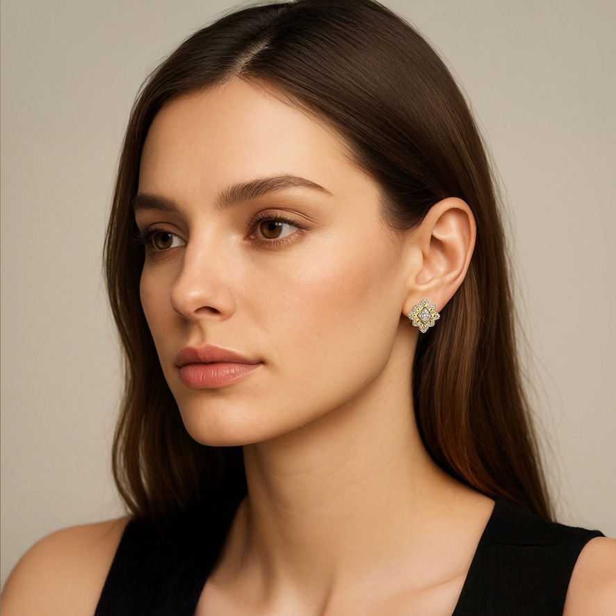 Woman Wearing Diamond-shaped Gold and Silver Studs