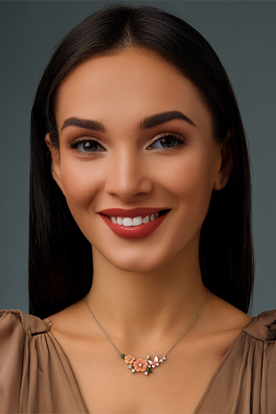Woman Wearing A bit of a French Garden in a Necklace