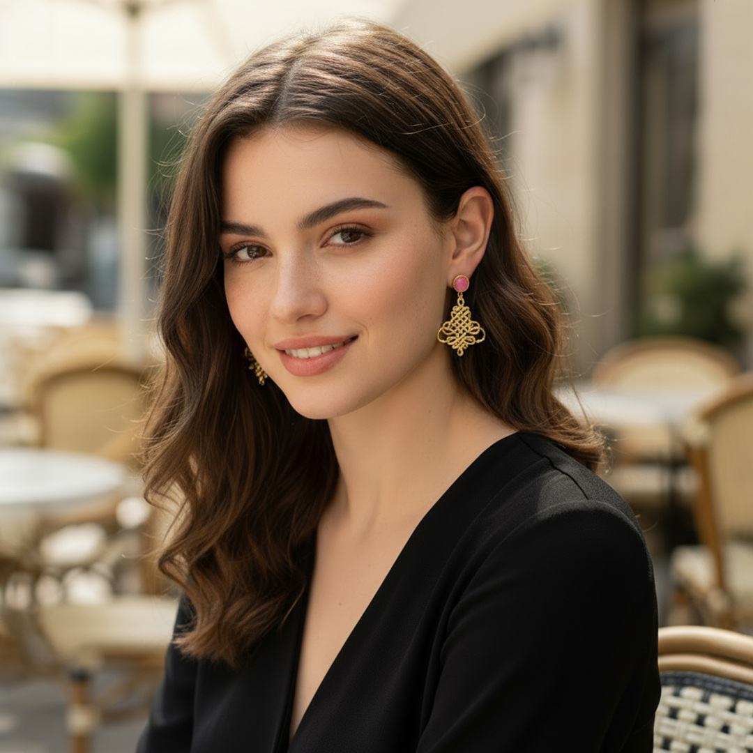 Woman Wearing Pink Chalcedony and Gold Designed Earrings