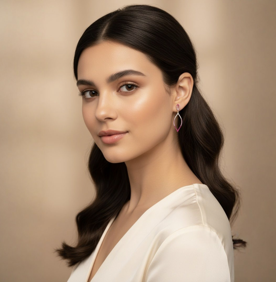 Woman Wearing Shades of Pink in Crystal Earrings