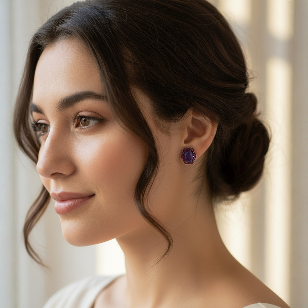Woman Wearing Tanzanite and Ruby Earrings